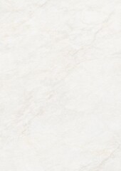 Close-up of white textured surface resembling marble or stone with subtle veining patterns