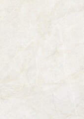 Close-up of a textured white surface with subtle cracks and natural patterns