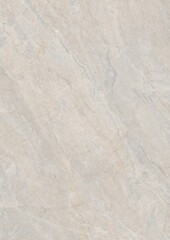 Close-up view of a light-colored marble surface with subtle veining patterns
