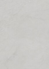Close-up of a light gray textured surface with subtle marbling patterns