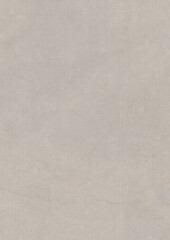 Close-up of a textured gray surface with subtle variations in tone and minor imperfections