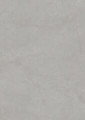 Close-up of a textured gray surface with subtle scratches and fine lines