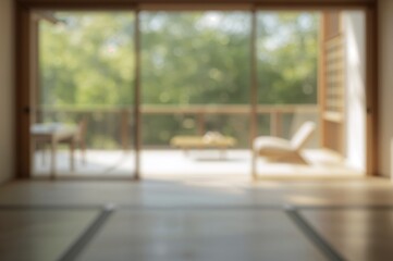 Fototapeta premium Softly blurred backdrop of a tranquil minimalist living space with tatami flooring and wooden accents, bathed in natural light from expansive windows.