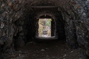 Obraz premium View from inside a deserted gold mine looking outward