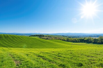 Fototapeta premium Bright countryside scene with parallax image overlay featuring agricultural land, meadows, and lush green hills under a clear summer sky with mountains in the distance. Vector art.