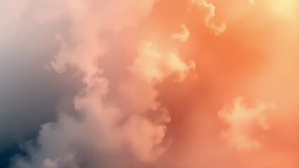 Fototapeta premium Dreamy sunset clouds in warm orange and soft grey hues
