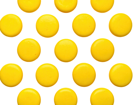 Bright yellow round treats arranged in a honeycomb pattern