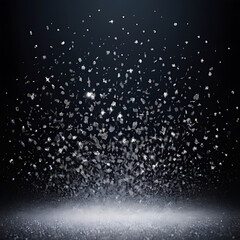 Obraz premium Abstract dark background with falling glittering particles and spotlight