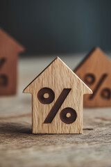 Wooden house shapes featuring percentage signs convey themes of mortgage rates, property taxes, financial investments, and real estate market trends.