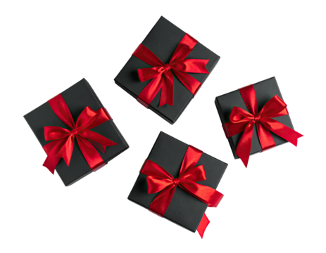 Four black gift boxes with red ribbons