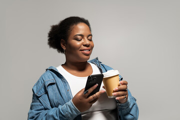 Stylish autumn vibes from a confident plus size woman in a studio setting