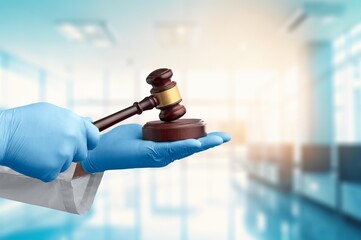 Forensic medicine, doctor hold law concept