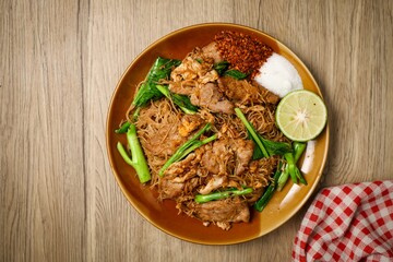Stir-fried Rice Vermicelli Noodles with Soy Sauce and Pork, thai called Pad see ew