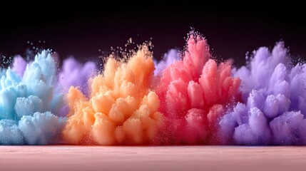 Vibrant Color Powder Explosion on Dark Background Displaying Hues of Blue Orange Pink and Purple