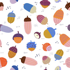 Cute&nbsp;seamless pattern with colourful hand drawn acorns. Bright autumn tiling background.