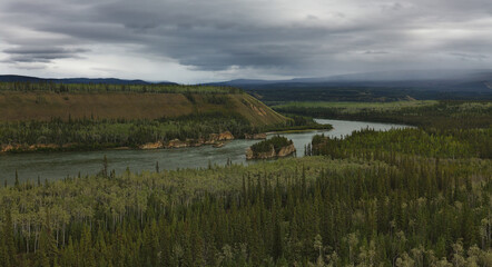 Yukon alaska usa mountains and forested slopes