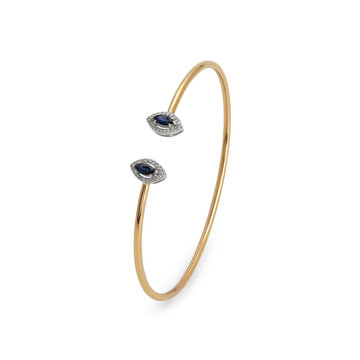 Gold Bracelet with Ruby and Diamond Center on White Background