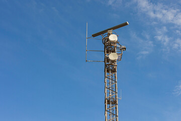 Border guard. A surveillance system for coastal and terrestrial supervision. SIVE system technologies in Alicante, Spain. Marine radar tower monitoring maritime zones and intercepting potential danger