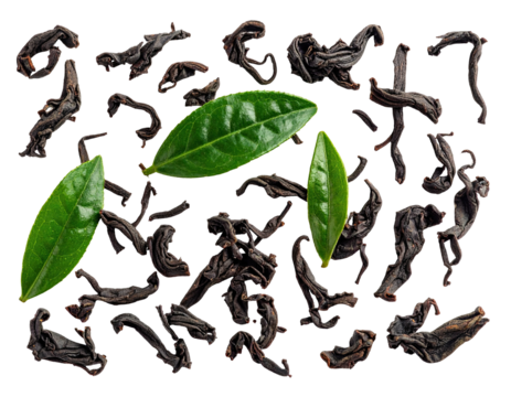 Dark tea leaves scattered with vibrant green tea leaves