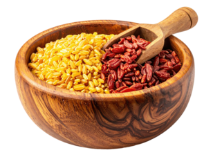 Wooden bowl filled with yellow grains and red berries.  A wooden scoop is partially immersed