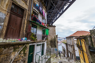 Townhouses under the Dom Luis I Bridge in Porto city, Portugal