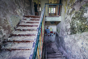 Stairs in abandoned kindergarten in Skrunda 1 Soviet military ghost town and former radar station, Latvia