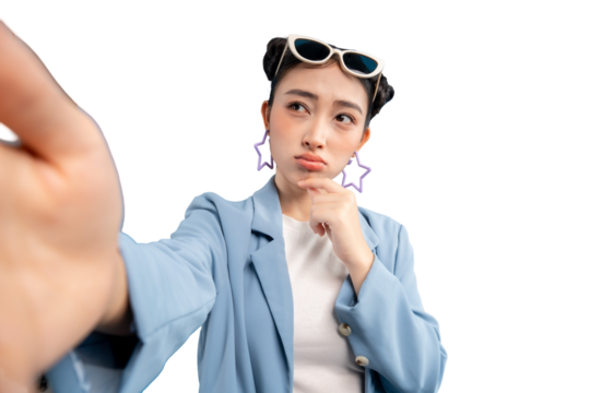 Selfie portrait of a young Asian woman posing with a thoughtful expression on PNG