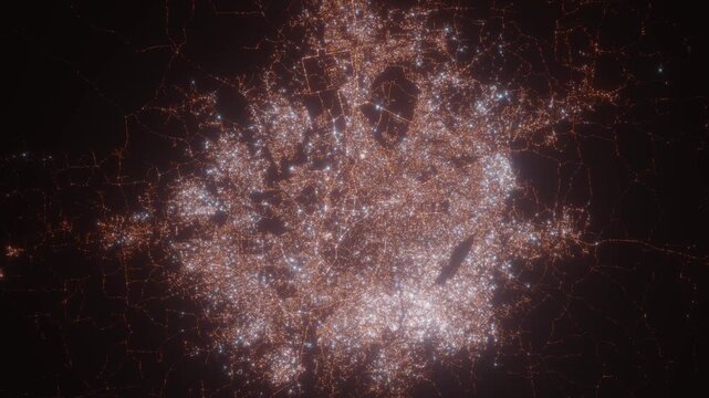 Ibadan (Nigeria) aerial view at night. View on modern city from space. Camera is zooming in, rotating counterclockwise