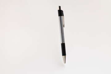 Pen resting on white surface