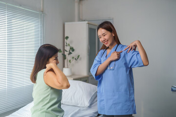 Doctor explaining shoulder pain to patient in hospital room