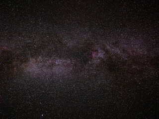 Obraz premium Milky way stars and constellations with a galaxy background photographed from a dark countryside location.