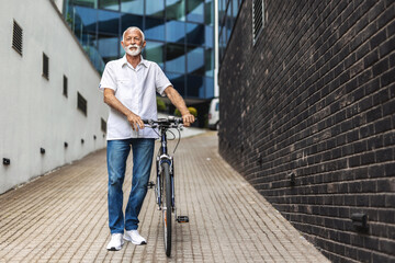 Person, entrepreneur and employee with bicycle, transportation and sustainability. Businessman with bicycle standing in the city.