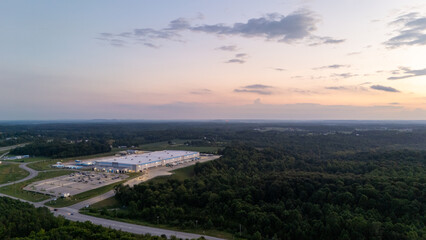 New facility glowing in the sunset from above