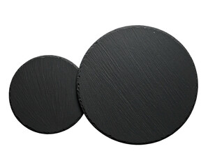 Two dark gray slate serving plates, one slightly smaller, positioned vertically