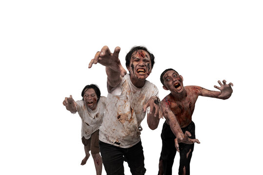 Portrait of three scary male zombies with wounds and blood on their bodies isolated over a white background. Spooky expression. Concept of Halloween or Horror