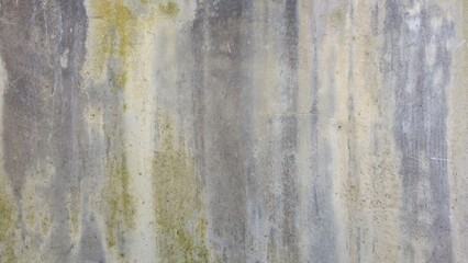 Old grey concrete wall with stains, uneven color, building wall, house, shop, and building wall texture image.