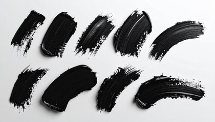 Black paint brushstrokes on white background (1)