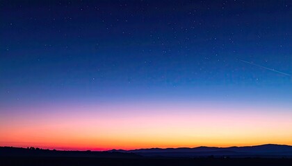 Obraz premium Twilight sky ablaze with stars. Horizon painted in vibrant sunset hues