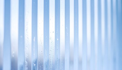 Light-blue frosted plastic panels with water droplets