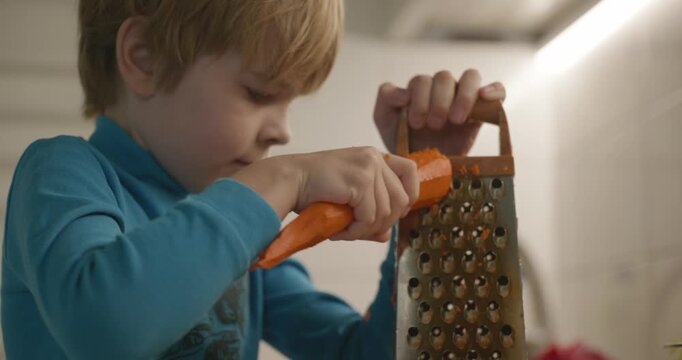 Boy Helps To Cook. Kid Prepare Food in Kitchen 4K 10-bit