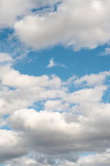 Vivid Blue Sky with Fluffy White Clouds