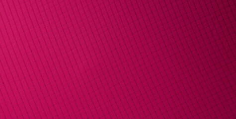 Close-Up of Magenta Technical Fabric with Subtle Grid Pattern