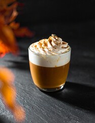 Cozy Autumn Pumpkin Spice Latte on Rustic Countertop – Warm Fall Coffee Drink Photography