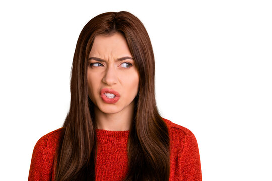 Portrait of mad annoyed person look see ugly object grimace dislike emotion expression concept wear red pullover sweater isolated over yellow color background