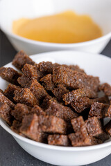 fried bread until crisp in sunflower oil with spices, delicious crispy rye bread croutons for cheese sauce
