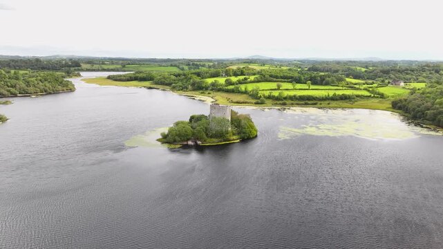 Cloughoughter Castle in small lake island and Irish green landscape. Co. Cavan, Ireland