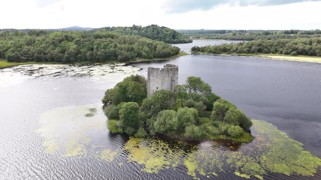 Cloughoughter Castle on small island in lake. Irish historical landmark, aerial. Co. Cavan