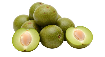 Isolated, fresh whole unripe green plums and halves displaying seeds with no background