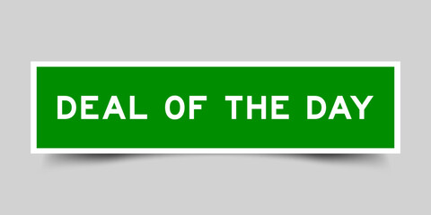 Green color square shape sticker label with word deal of the day on gray background