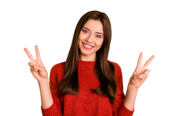 Portrait of positive cheerful youth girl have fun enjoy her free time autumn holidays make v-signs wear red sweater isolated over yellow color background